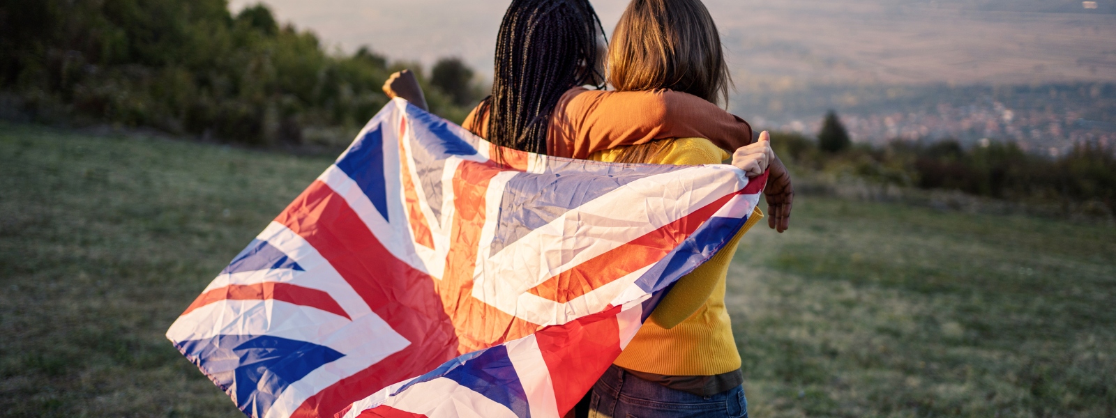hero-girls-with-flag-uk